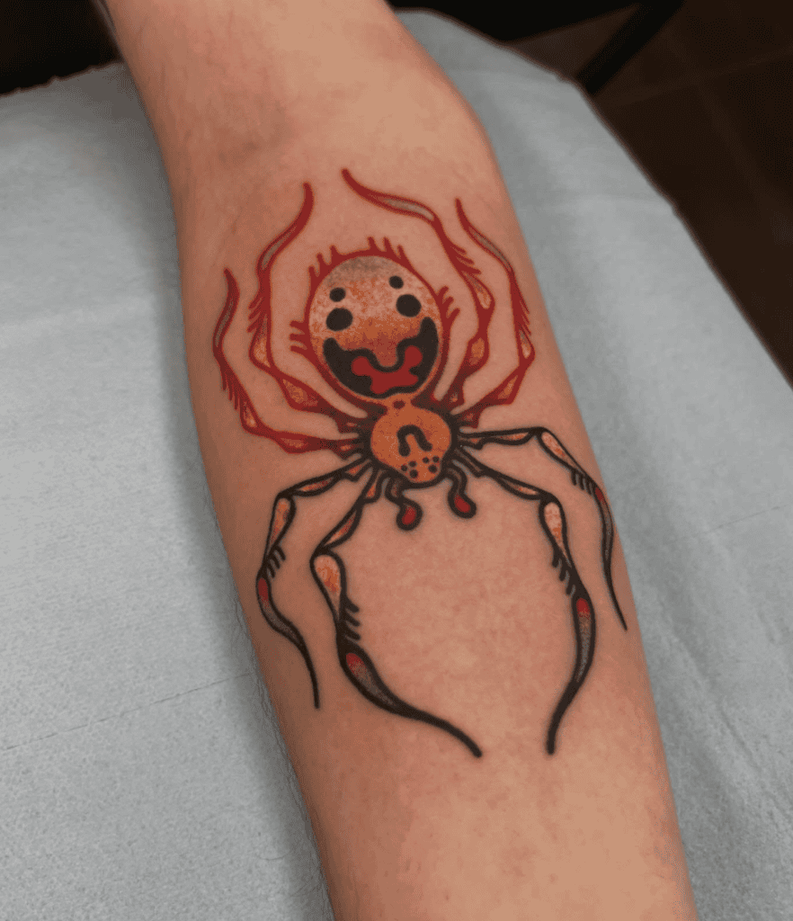 Happy Face Spider Crawl Tattoo