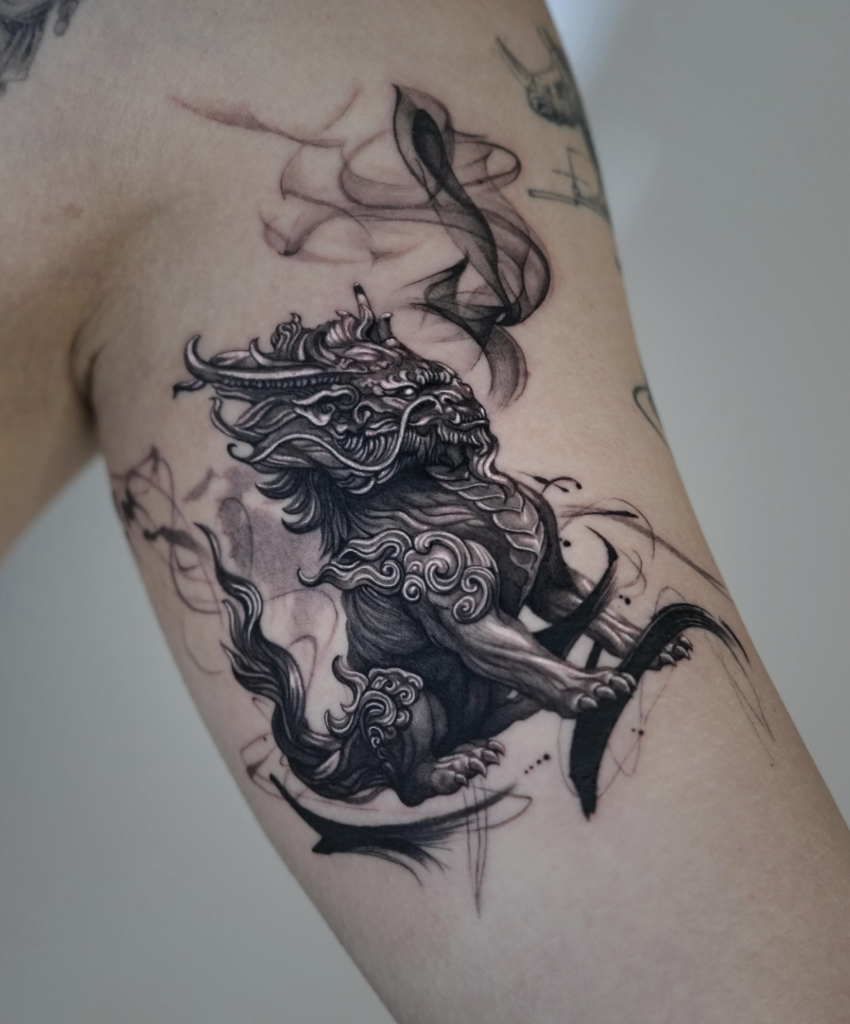 Suanni Lion Tattoo