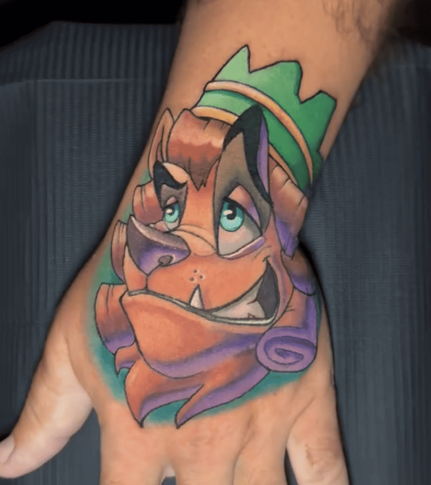 The Cowardly Lion Smirk Tattoo